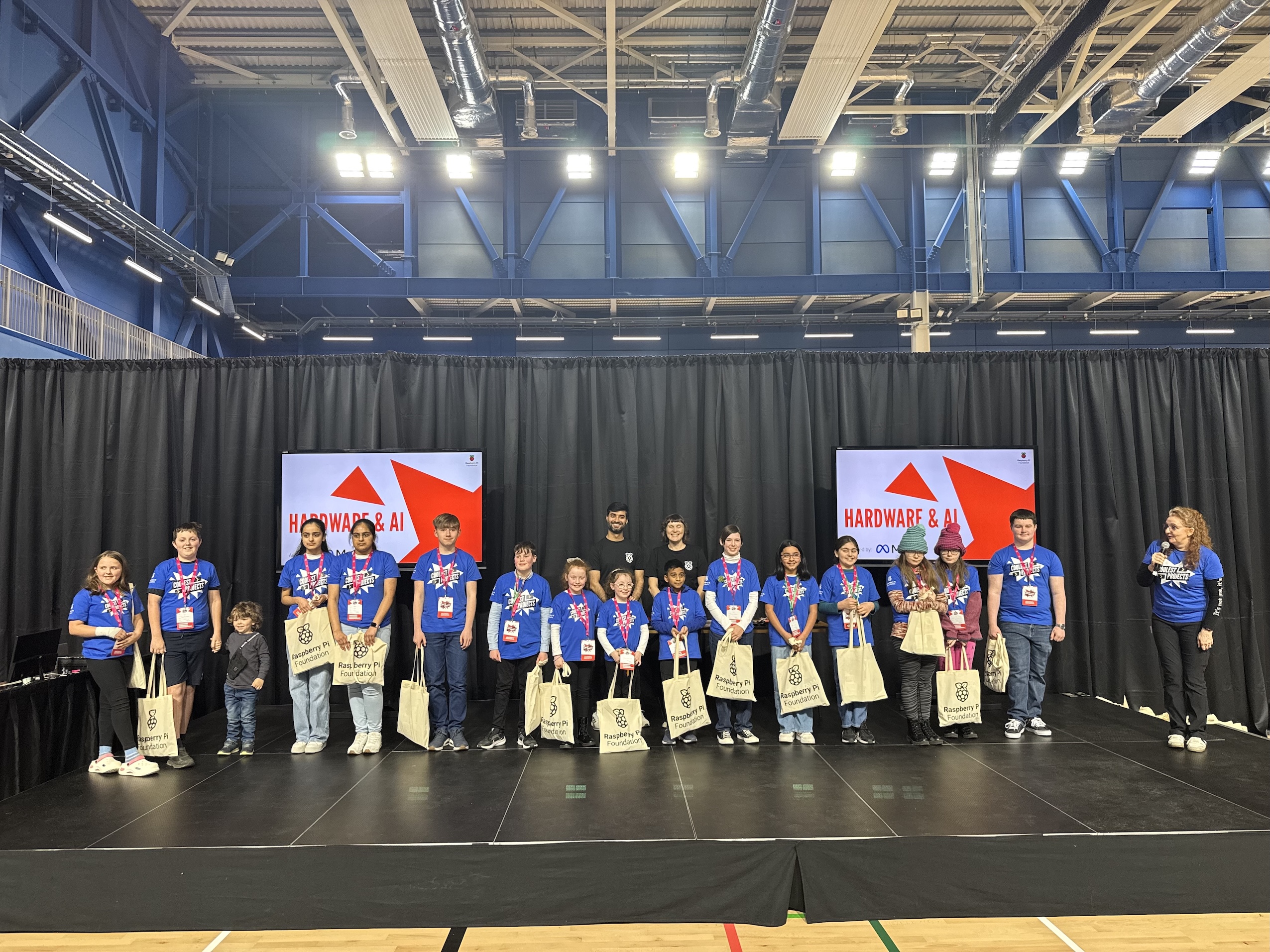 Photo of creators on stage at Coolest Projects Ireland alongside Meta judges.